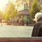 man sits on bench