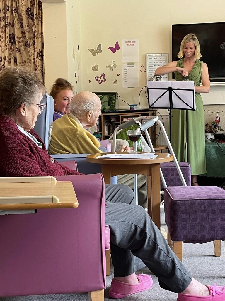 care homes sussex residents listening to singer