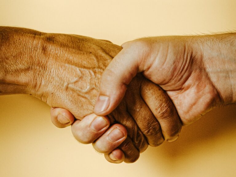 two people shaking hands