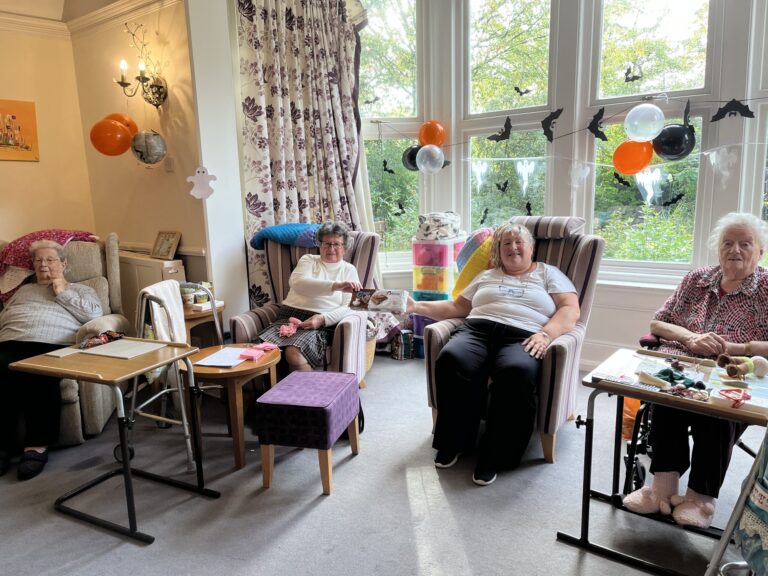 The care home resident happy about the cakes sharon brought from her visit