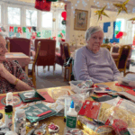 Two lovely ladies enjoying care home christmas activities