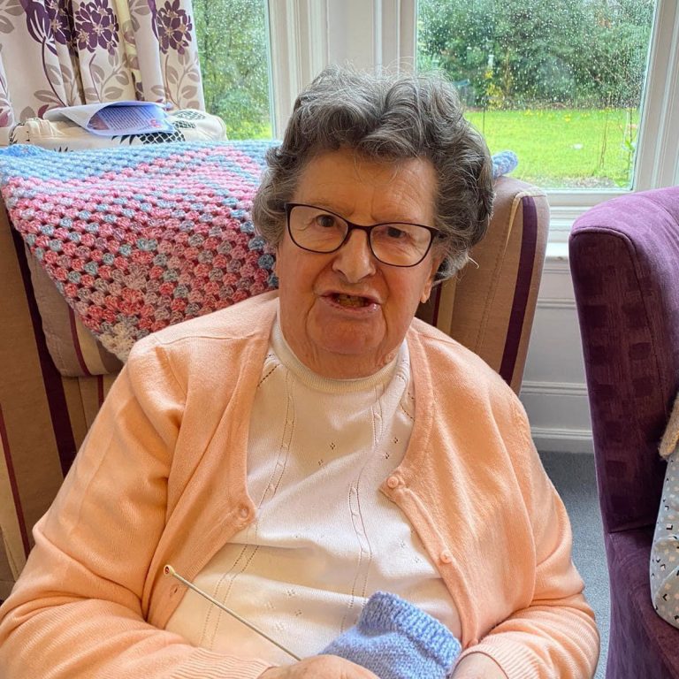 A resident at Hilgay Care home talking
