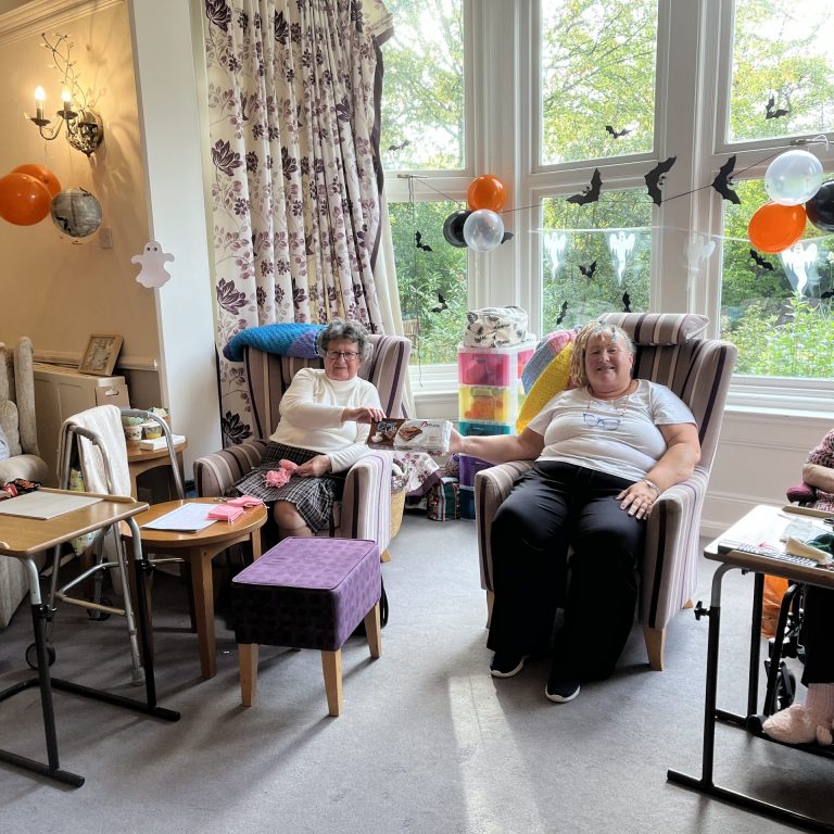 The care home resident happy about the cakes sharon brought from her visit