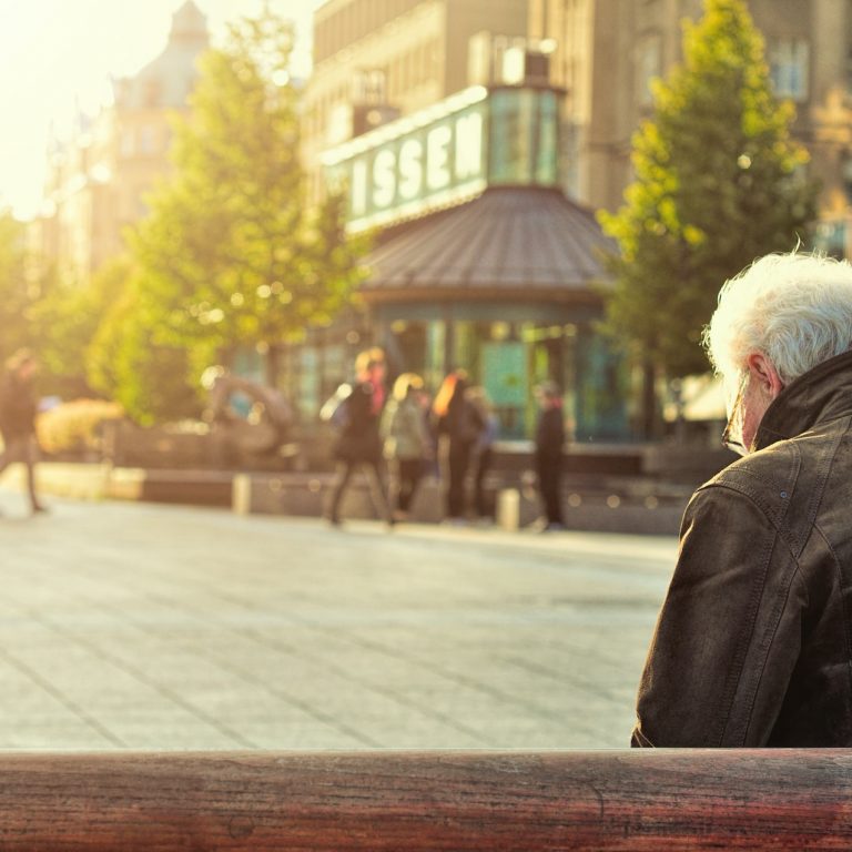man sits on bench