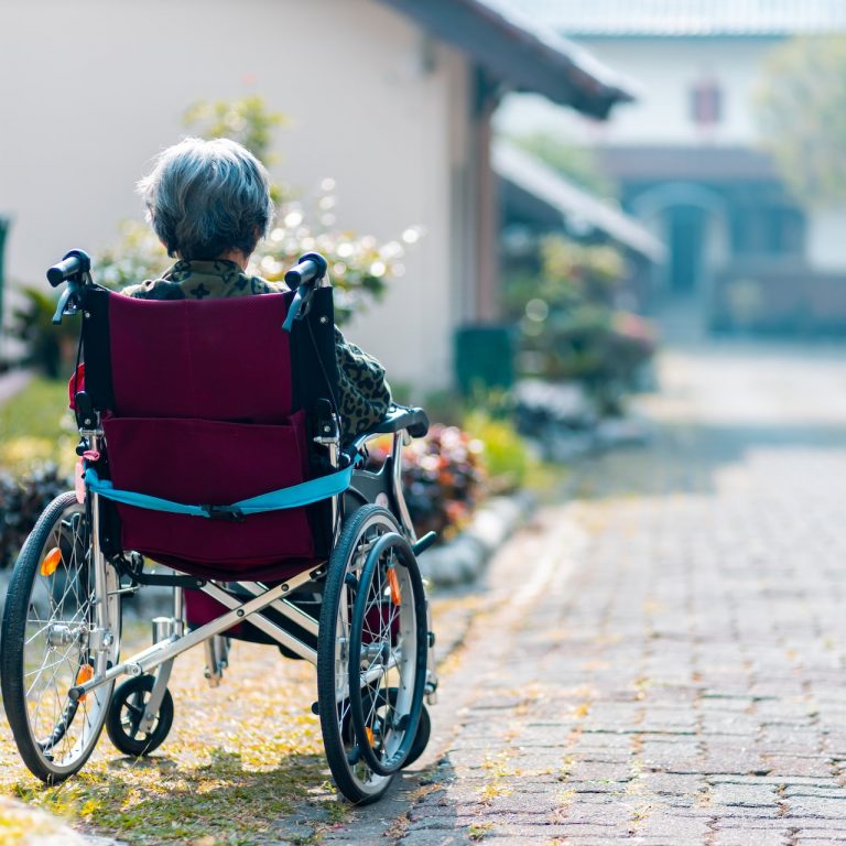 woman sat in wheelchair